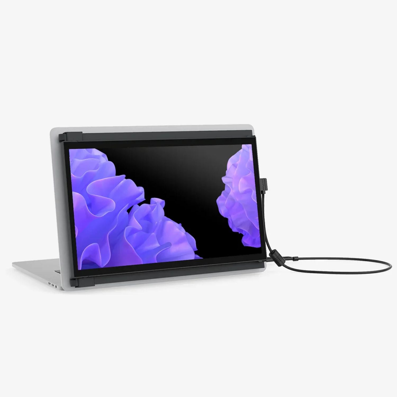 Vista del monitor portátil Mobile Pixels Duex Plus acoplado a laptop en parte trasera; diseño delgado, estructura resistente y sistema magnético deslizable ideal para productividad portátil y pantallas extendidas.